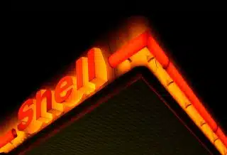 low angle photography of Shell gas station at night